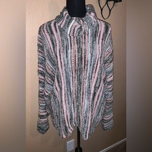 NWT. Super buttery soft multi colored turtle neck sweater